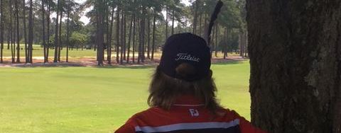 Regional Tournament at Pinehurst Day 2 : Parent caddies, or not.